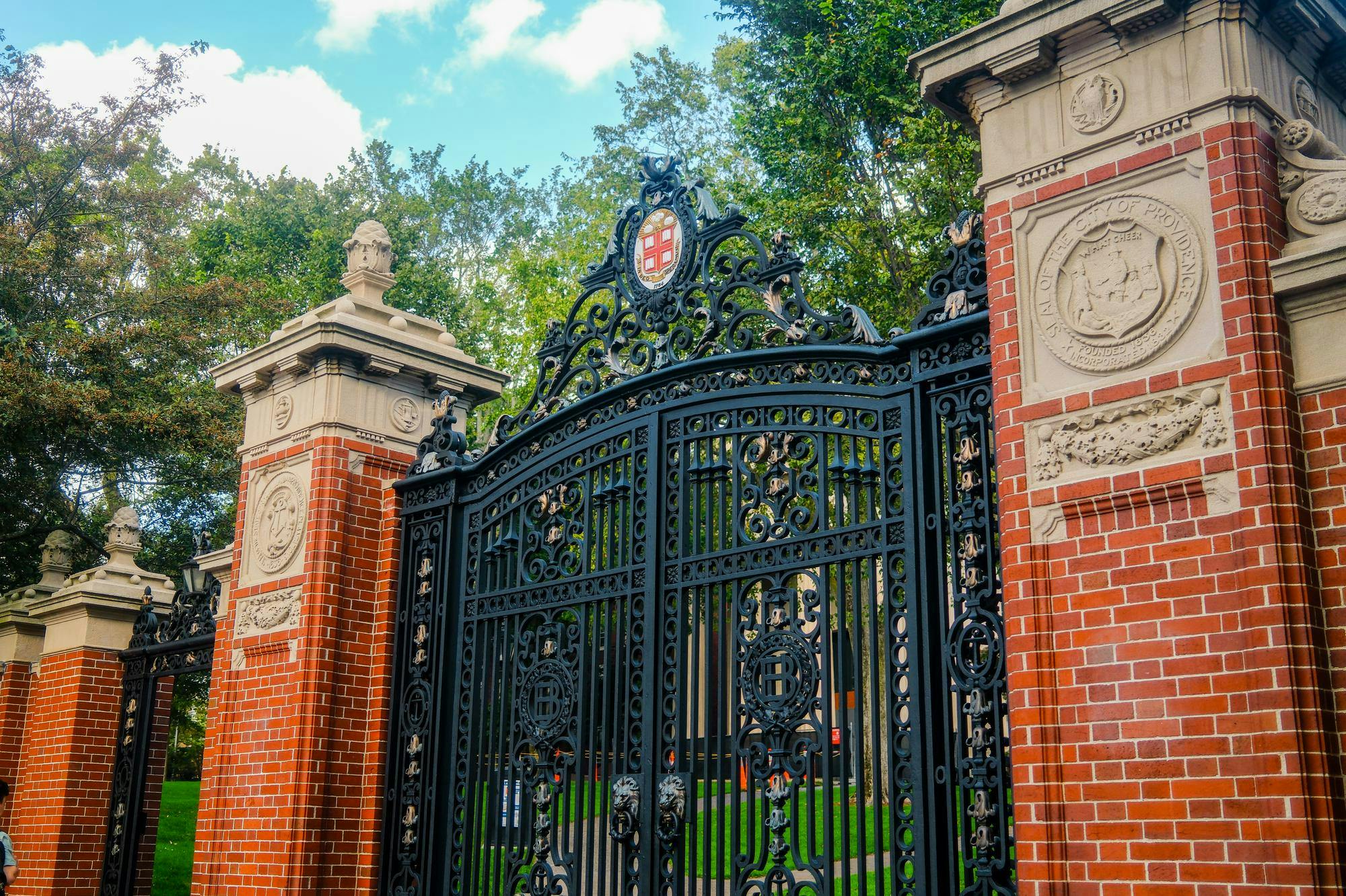 Close-up photo of Van Wickle Gates, the ornamental entrance to the Quiet Green and the Brown University campus.