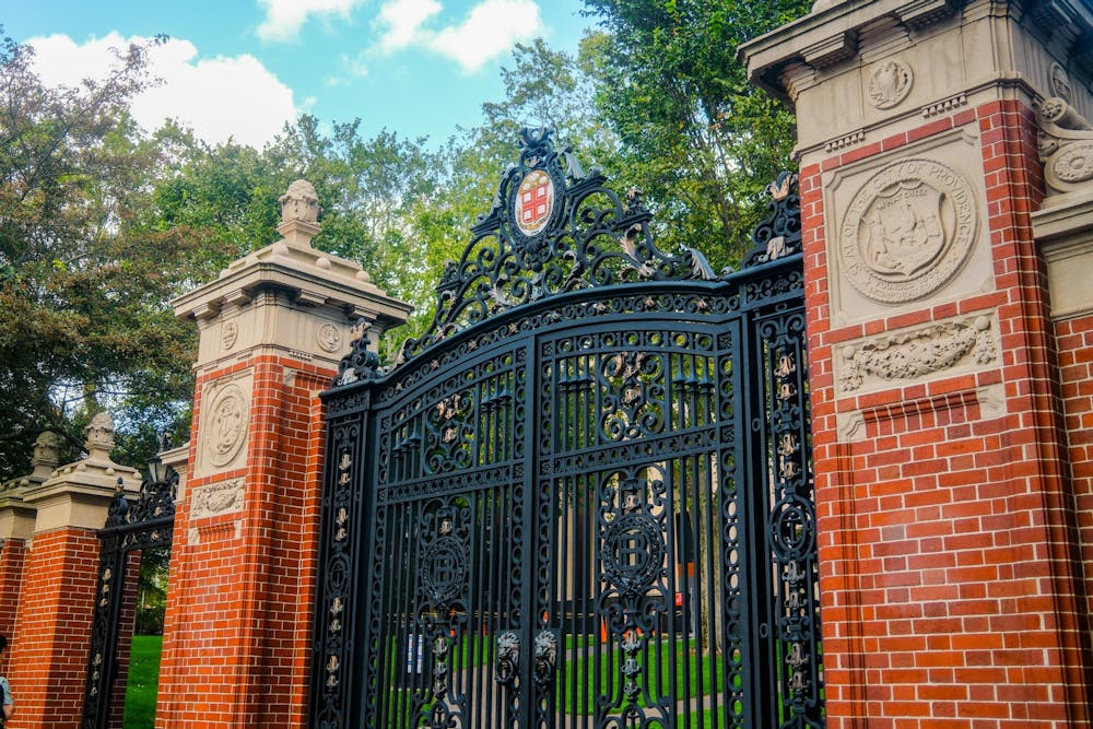 Close-up photo of Van Wickle Gates, the ornamental entrance to the Quiet Green and the Brown University campus.