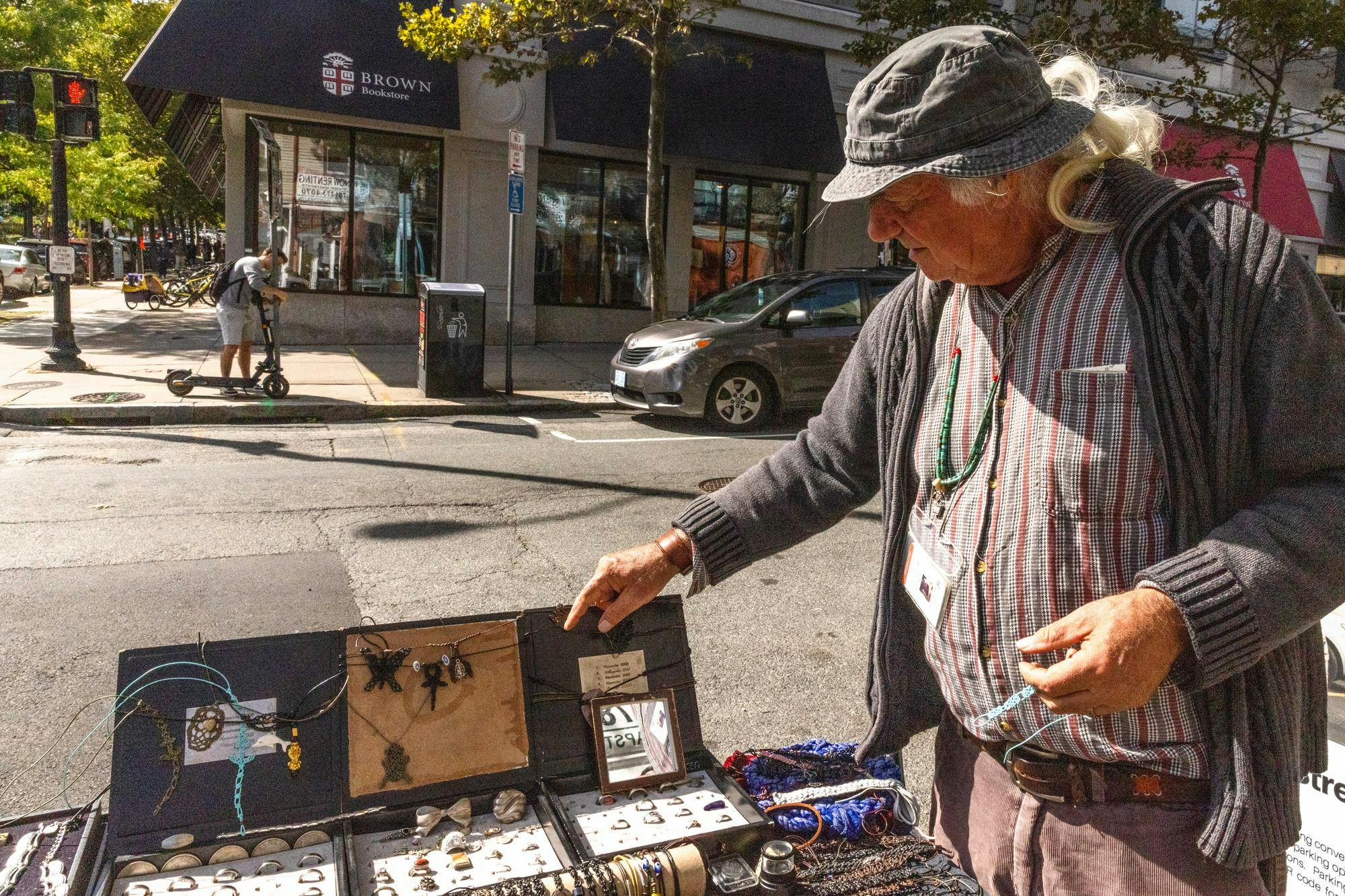 Photo of Jose Ruiz and his jewelry stand