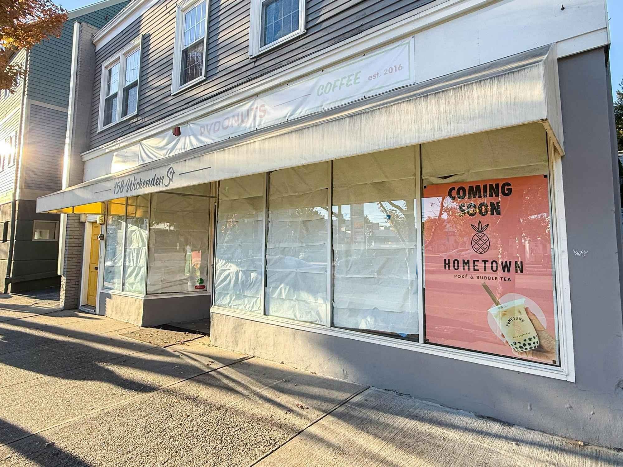 A photo of the coming soon sign of Hometown’s storefront.

