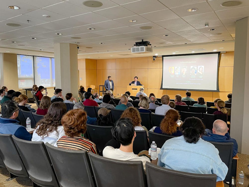 Haifan Lin speaks to a hall of over 50 people at Brown’s 2025 Mac V. Edds Lectureship