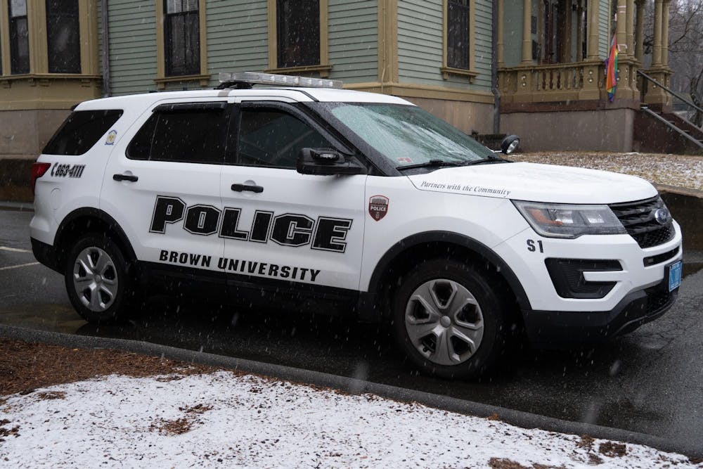 Photo of white Brown University Police SUV.

