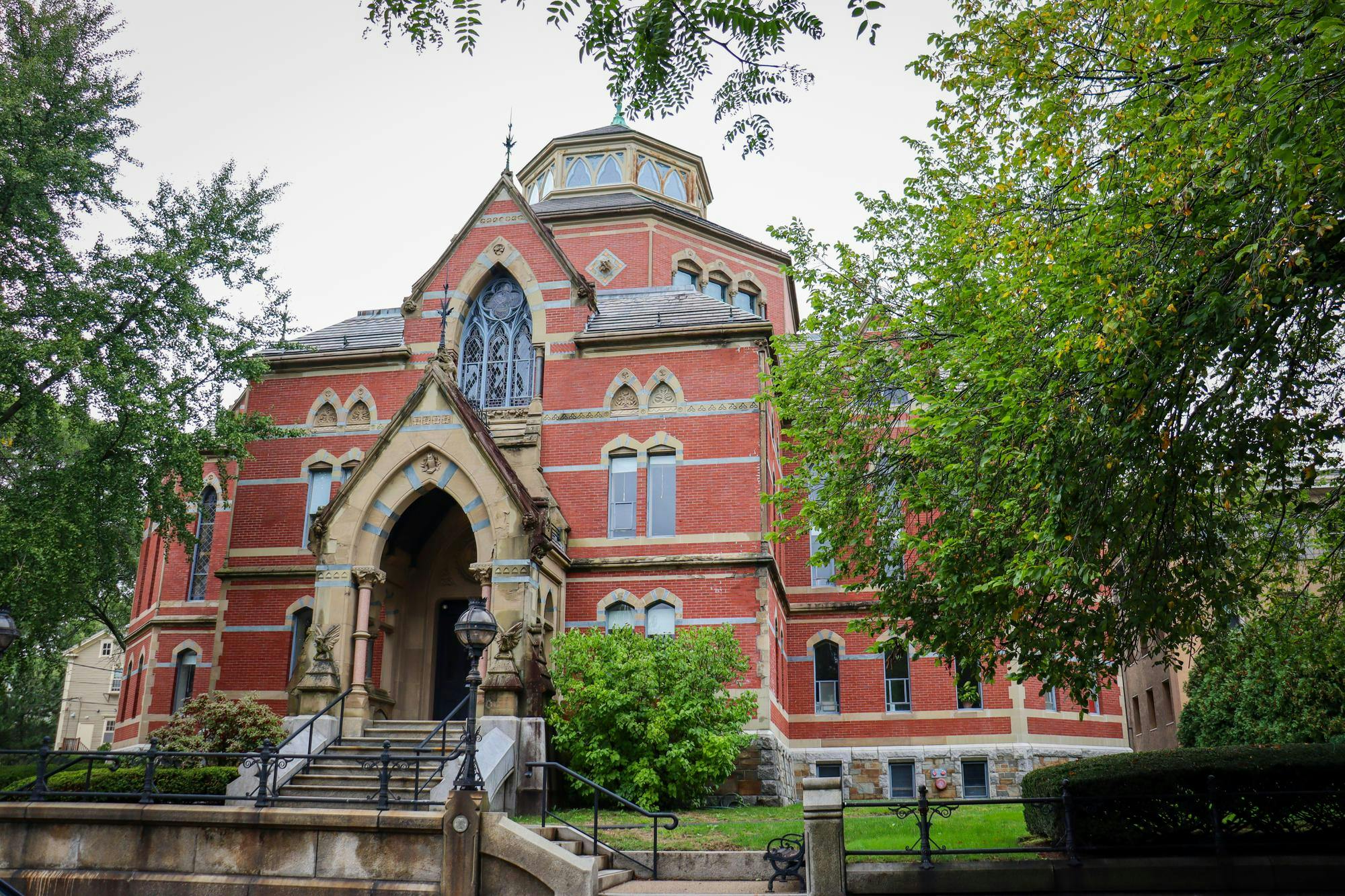 Brown University's Robinson Hall, which is a large, geometrical stone and brick building.