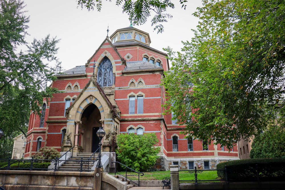 Brown University's Robinson Hall, which is a large, geometrical stone and brick building.