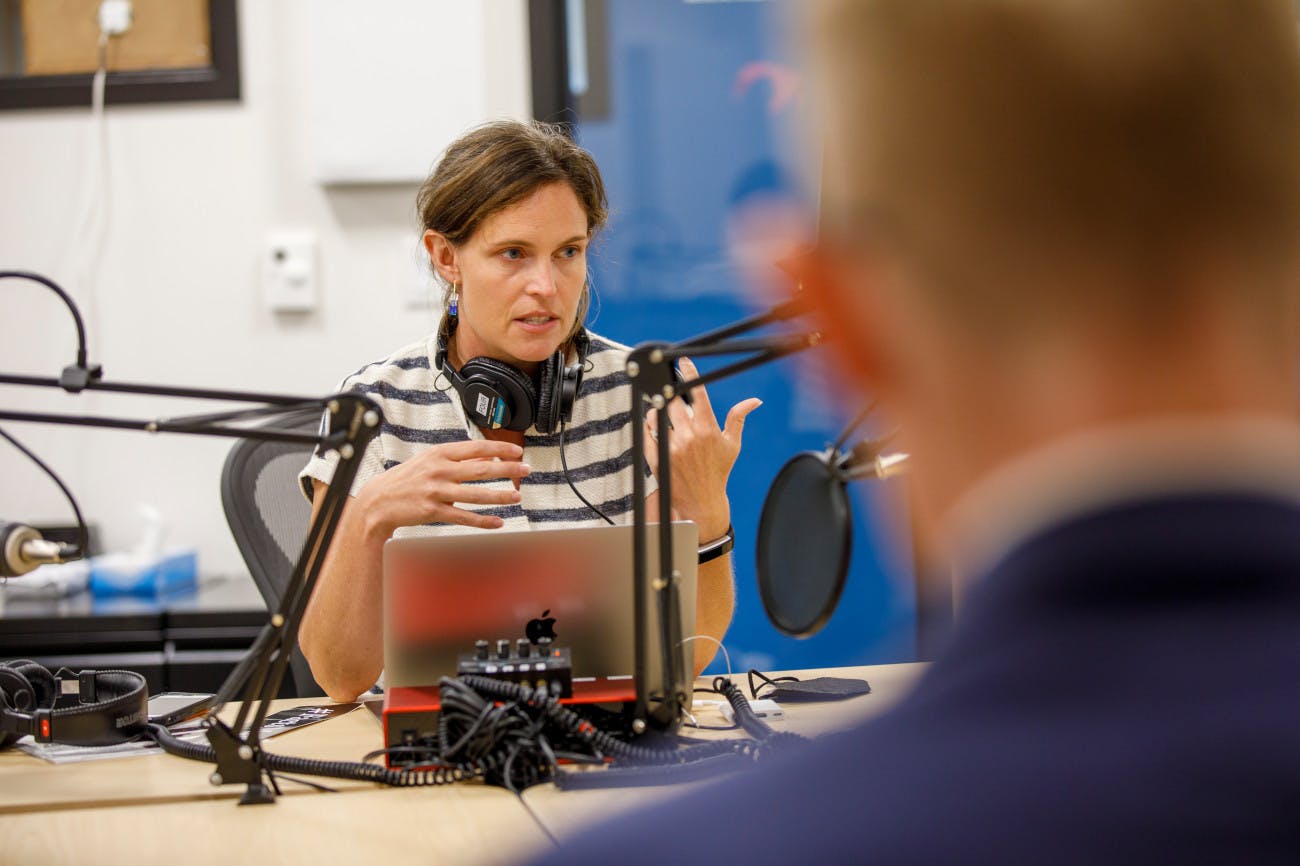 Megan Hall at her podcasting station