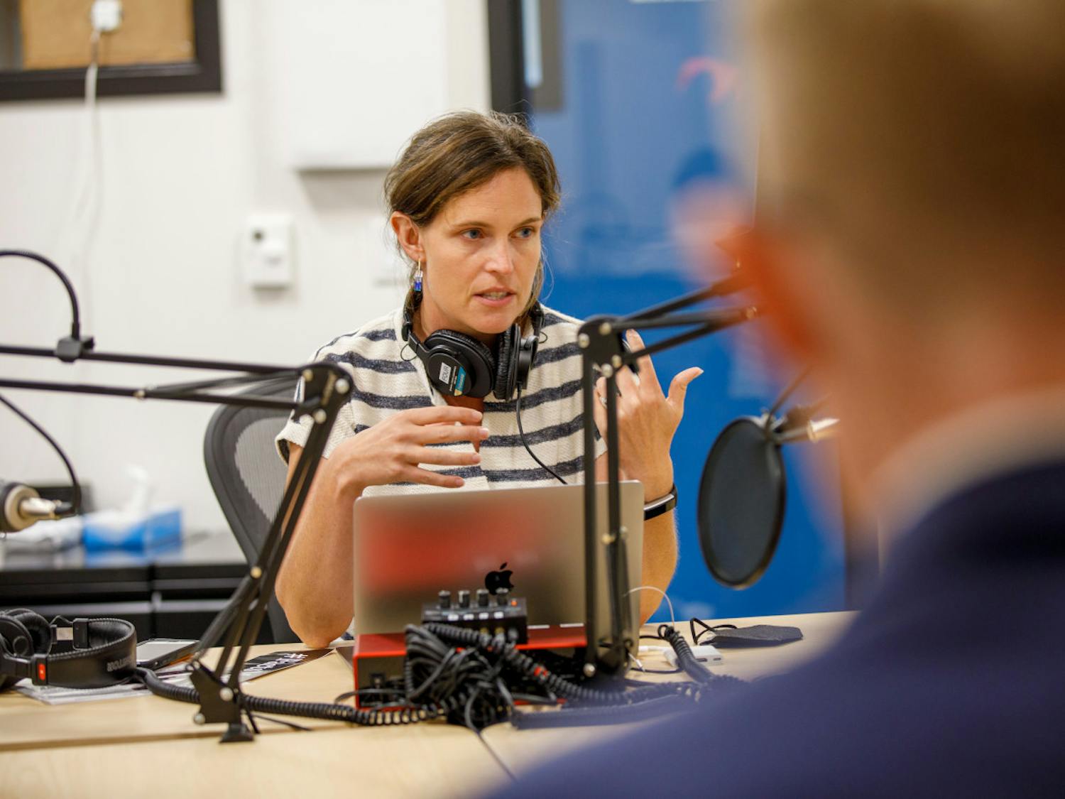 Megan Hall at her podcasting station