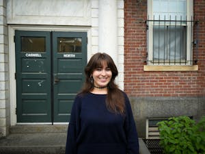 Photo of Delaney O'Dea '28 in front of building.