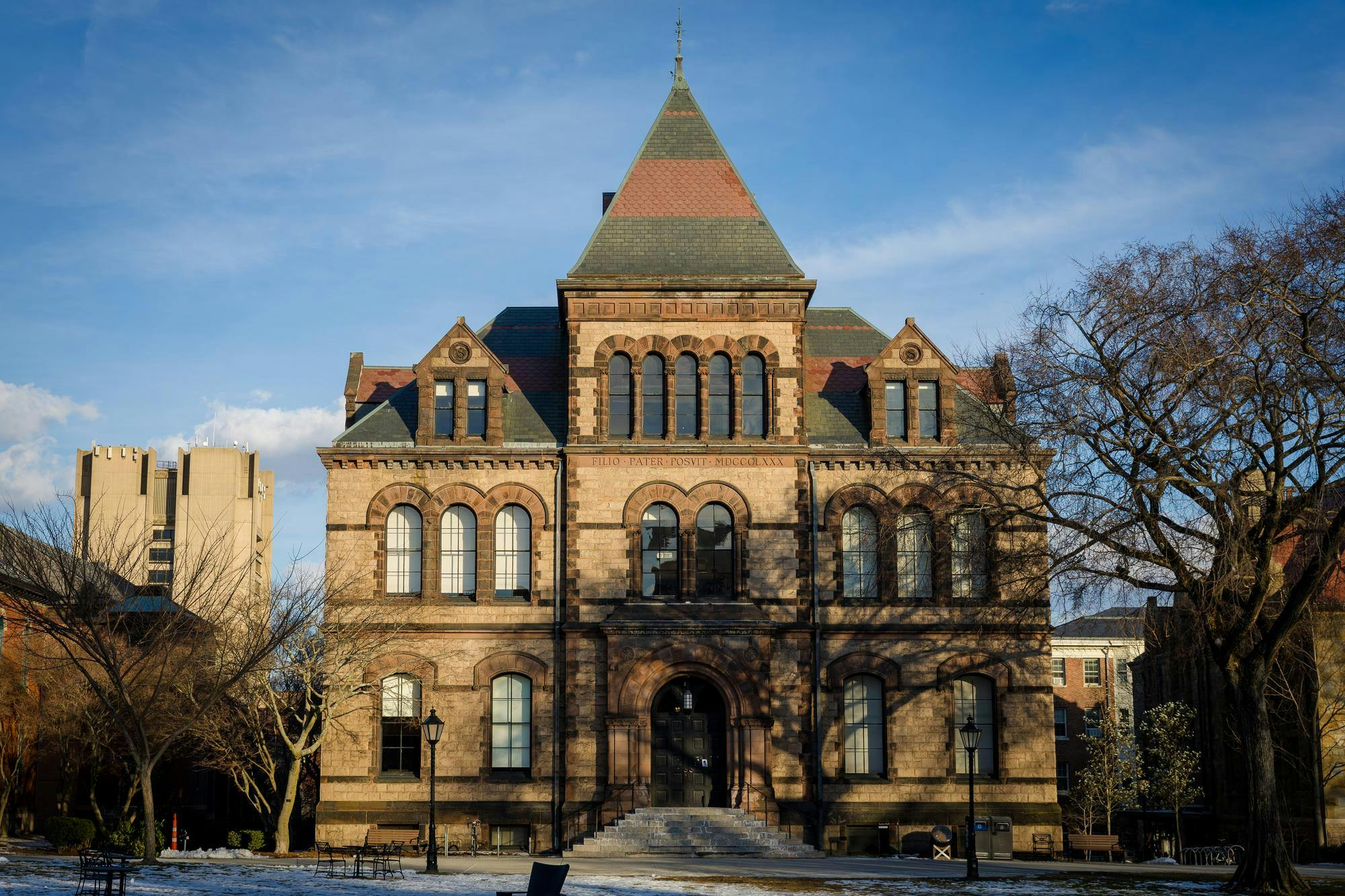 A picture of Sayles Hall on the Main Green during the winter.