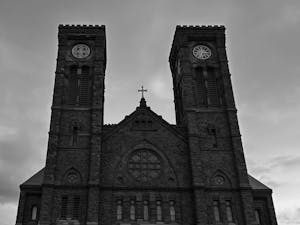 A black and white photo of the Diocese building.