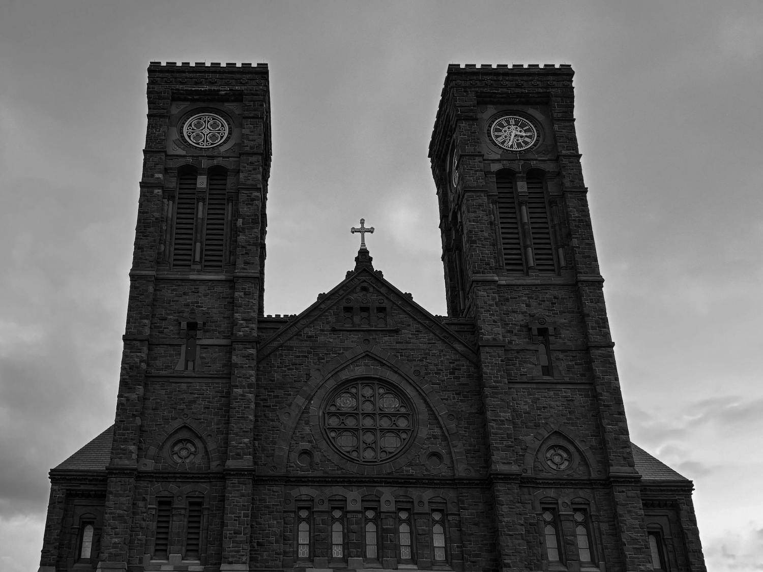 A black and white photo of the Diocese building.