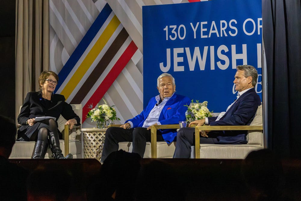 Photo of a panel discussion between Christina Paxson, Brian Moynihan, and Robert Kraft
