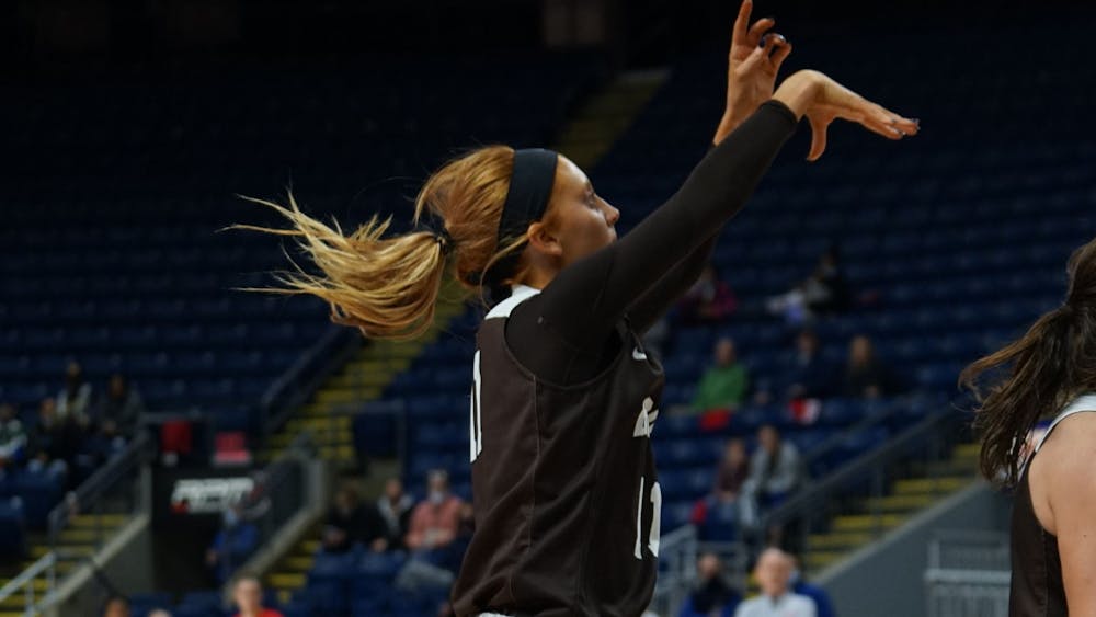 <p>Guard Maddie Mullin ’23 drained two three-pointers in 30 seconds in the third quarter of the game, ending the game four for six from behind the three point line.</p>