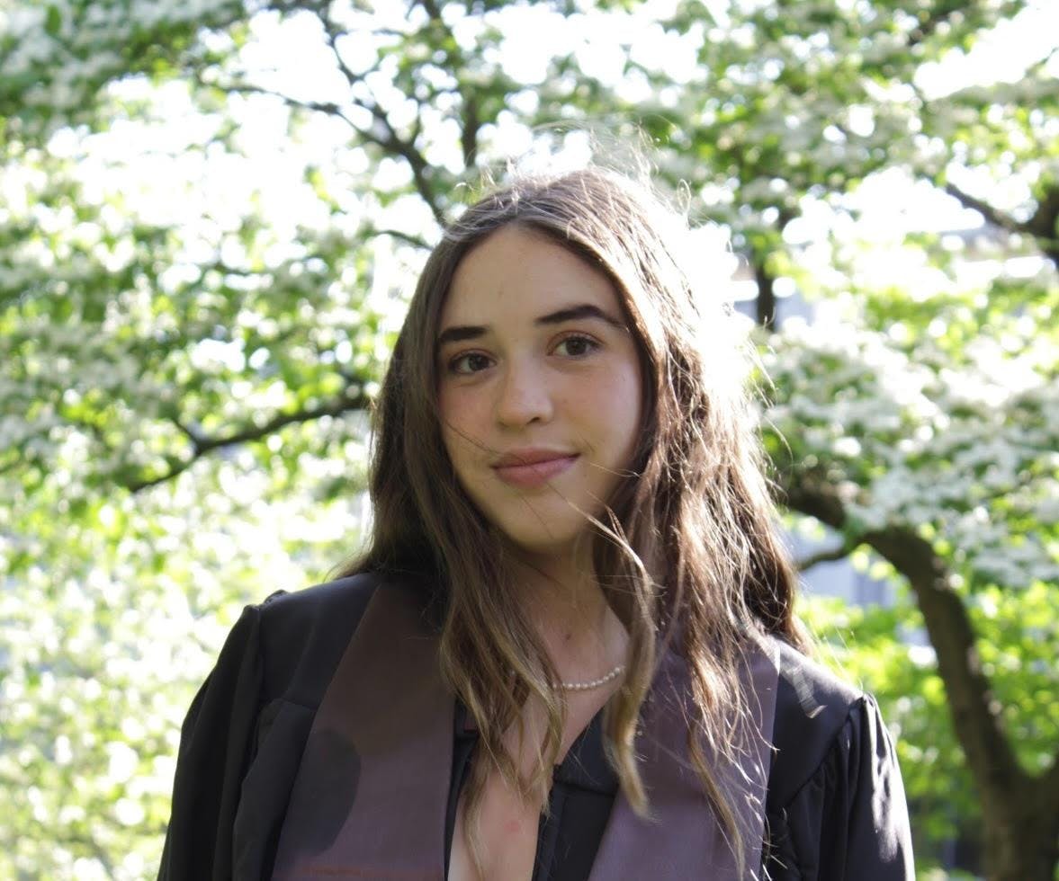 A portrait of Hana Butler Gutiérrez, with her pictured in the center of the frame.