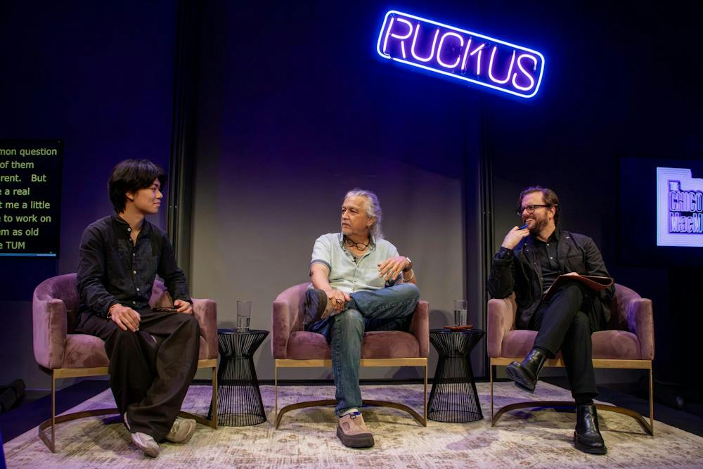 Photo of Tim Blake Nelson ’86, Dr. Sasha Costanza-Chock and Chicho MacMurtrie at a panel for the Brown Art Institute’s “Ruckus Sessions.”