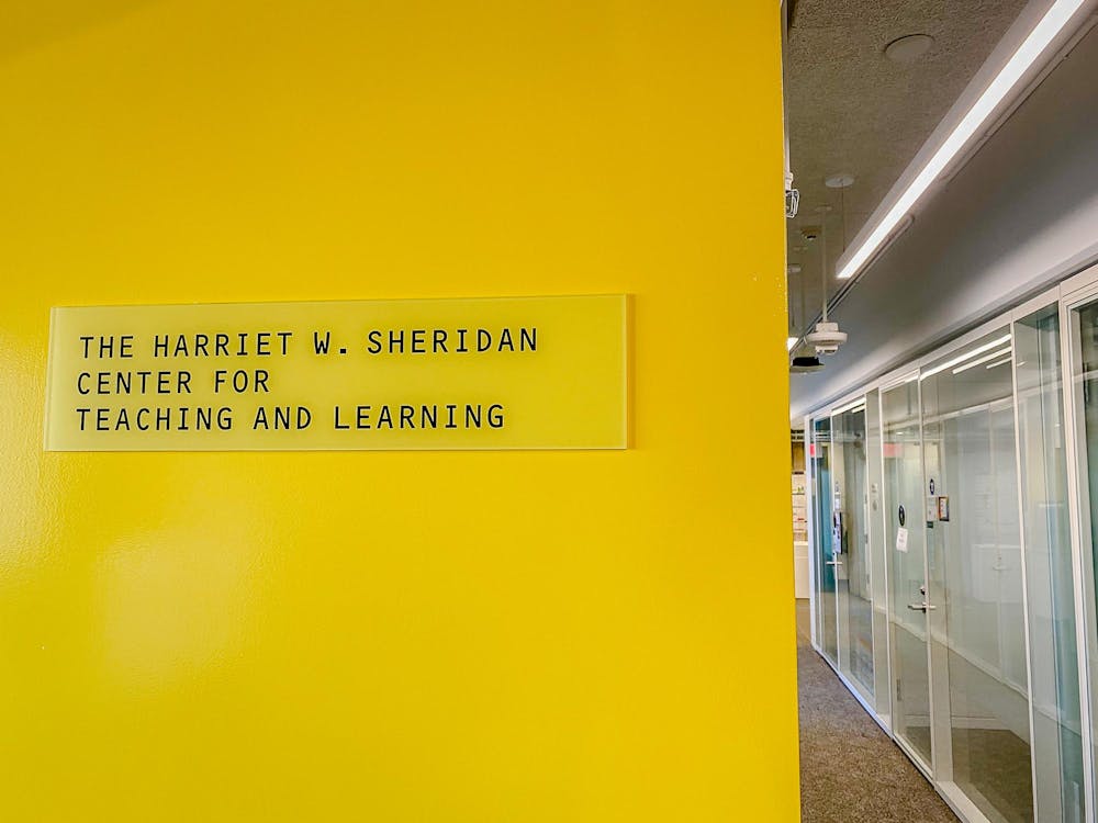 Yellow sign with text "The Harriet W. Sheridan Center for Teaching and Learning"