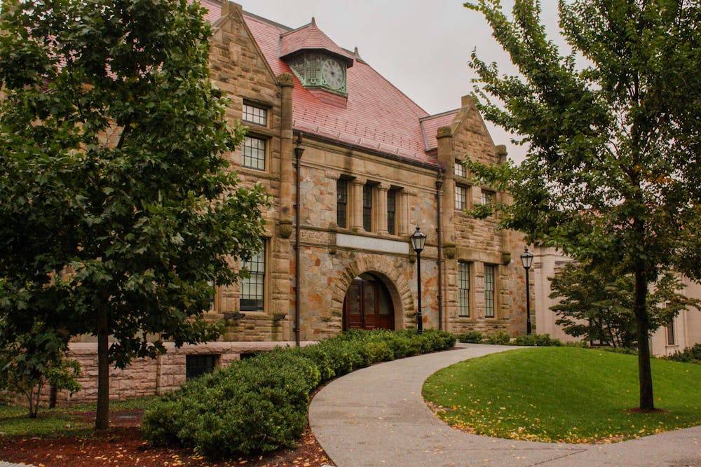 Photo of Friedman Hall, a stone building.

