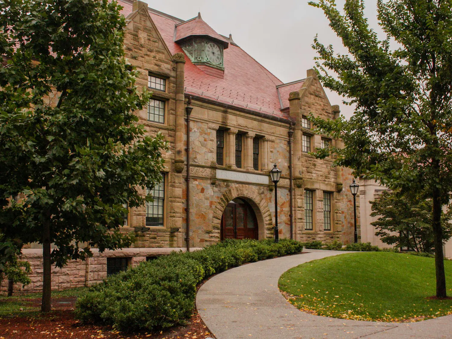 Photo of Friedman Hall, a stone building.