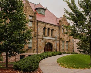 Photo of Friedman Hall, a stone building.