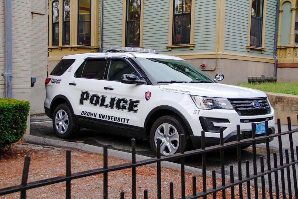 A photo of a Brown University public safety vehicle, outside of the Brown University Department of Public Safety.