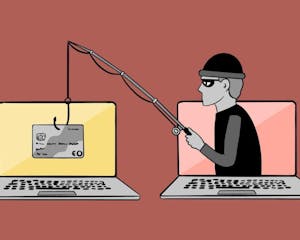 Two computer screens, one with a burglar and a fishing rod, the other with a card hooked onto the line.