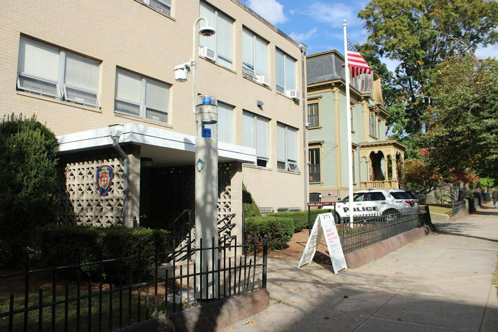 A photo of the front of the DPS building on a sunny day. 
