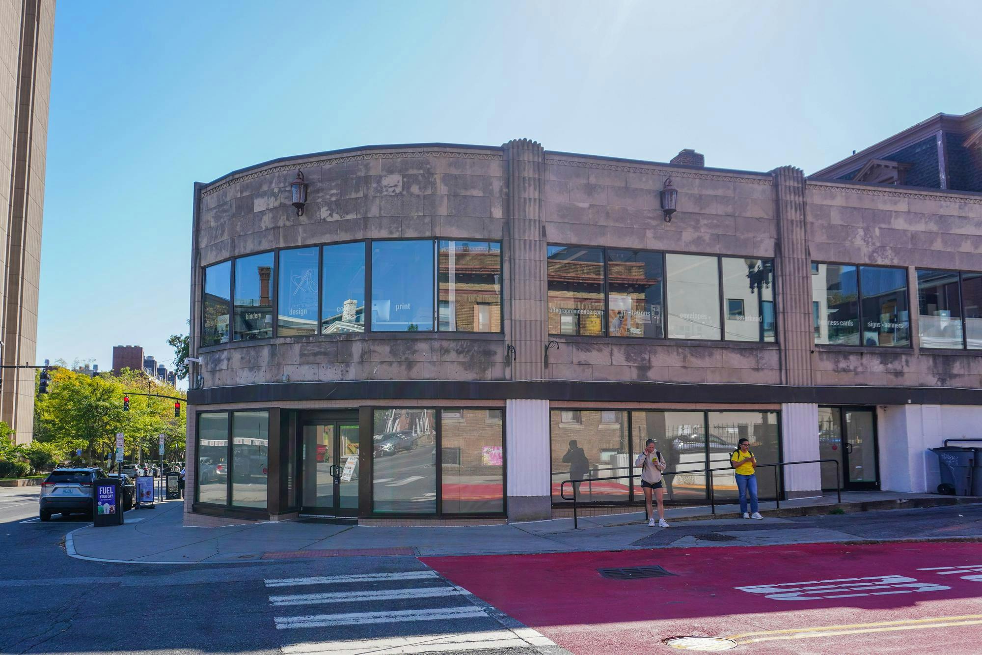 Photo of 218 Thayer Street, formerly the site of Starbucks, with its windows papered over.