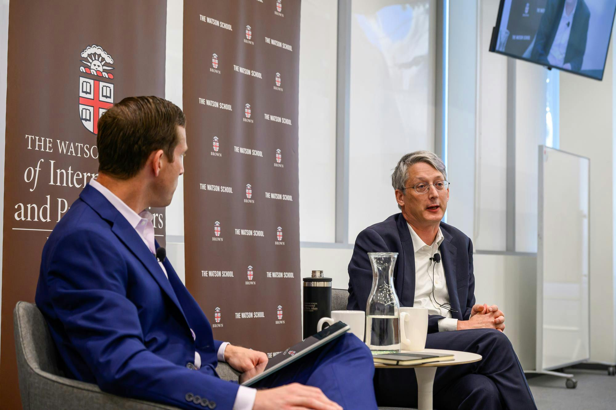 Photo of former Under Secretary of Education James Kvaal and Dean of the Watson School John Friedman at Tuesday's talk.