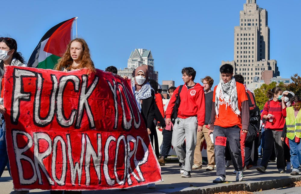 <p>The protestors marched from the Main Green down to the Warren Alpert Medical School, where the Corporation meeting was held.</p>