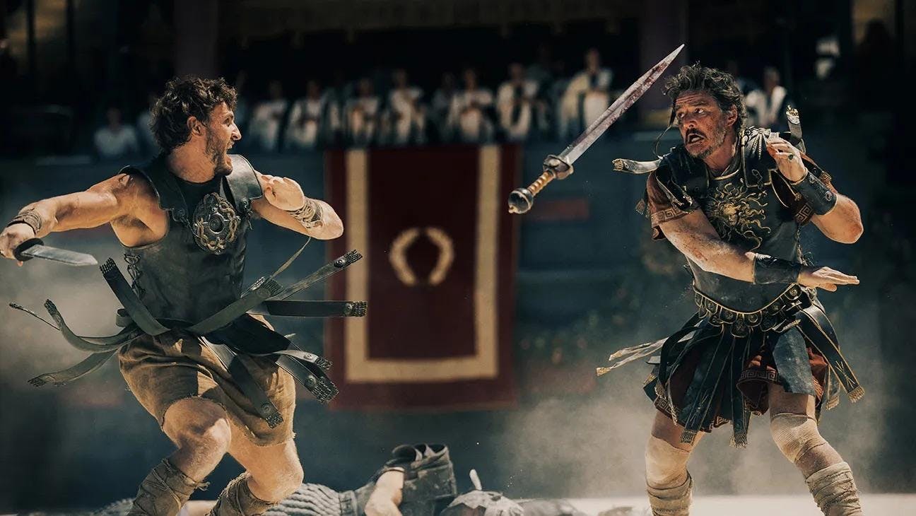 Two roman Gladiators played by Paul Mescal (left) and Pedro Pascal (right) square off in a fight in the Colosseum