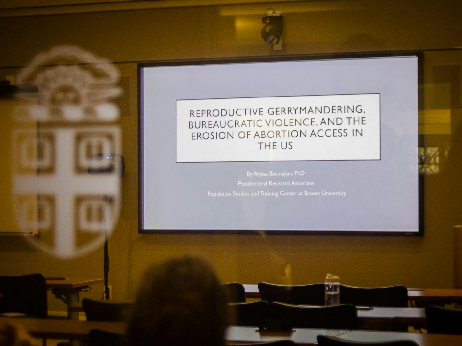 A presentation slide that says "Reproductive Gerrymandering Bureaucratic Violence, and the Erosion of Abortion Access in the U.S."