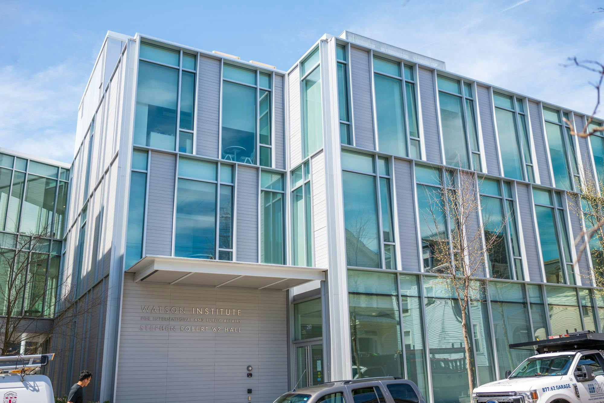 A photo of the outside of the Watson School for International and Public Affairs on a sunny day. 