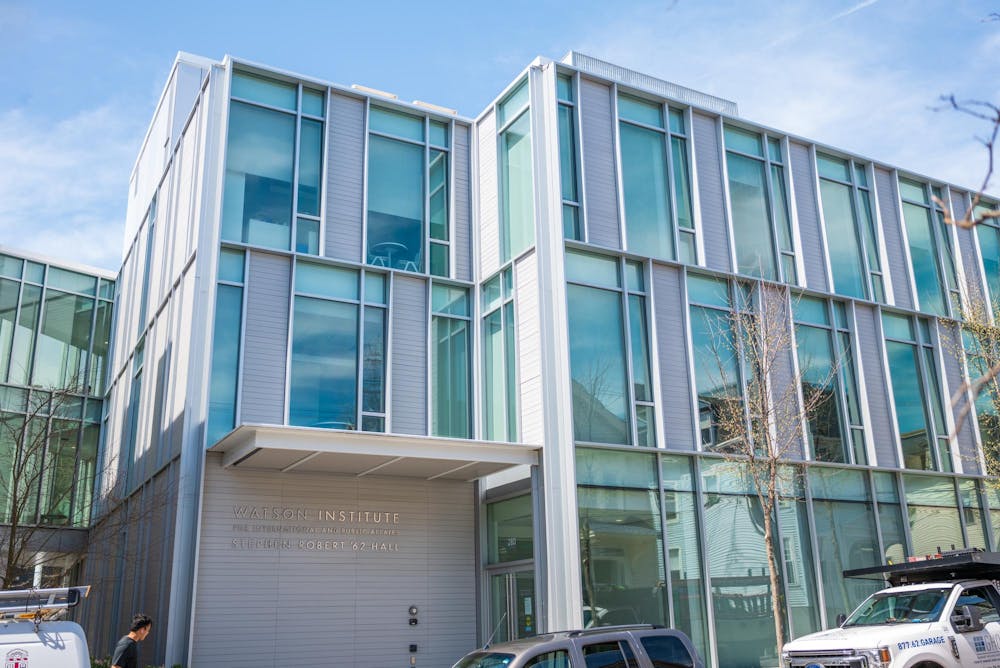 A photo of the outside of the Watson School for International and Public Affairs on a sunny day. 