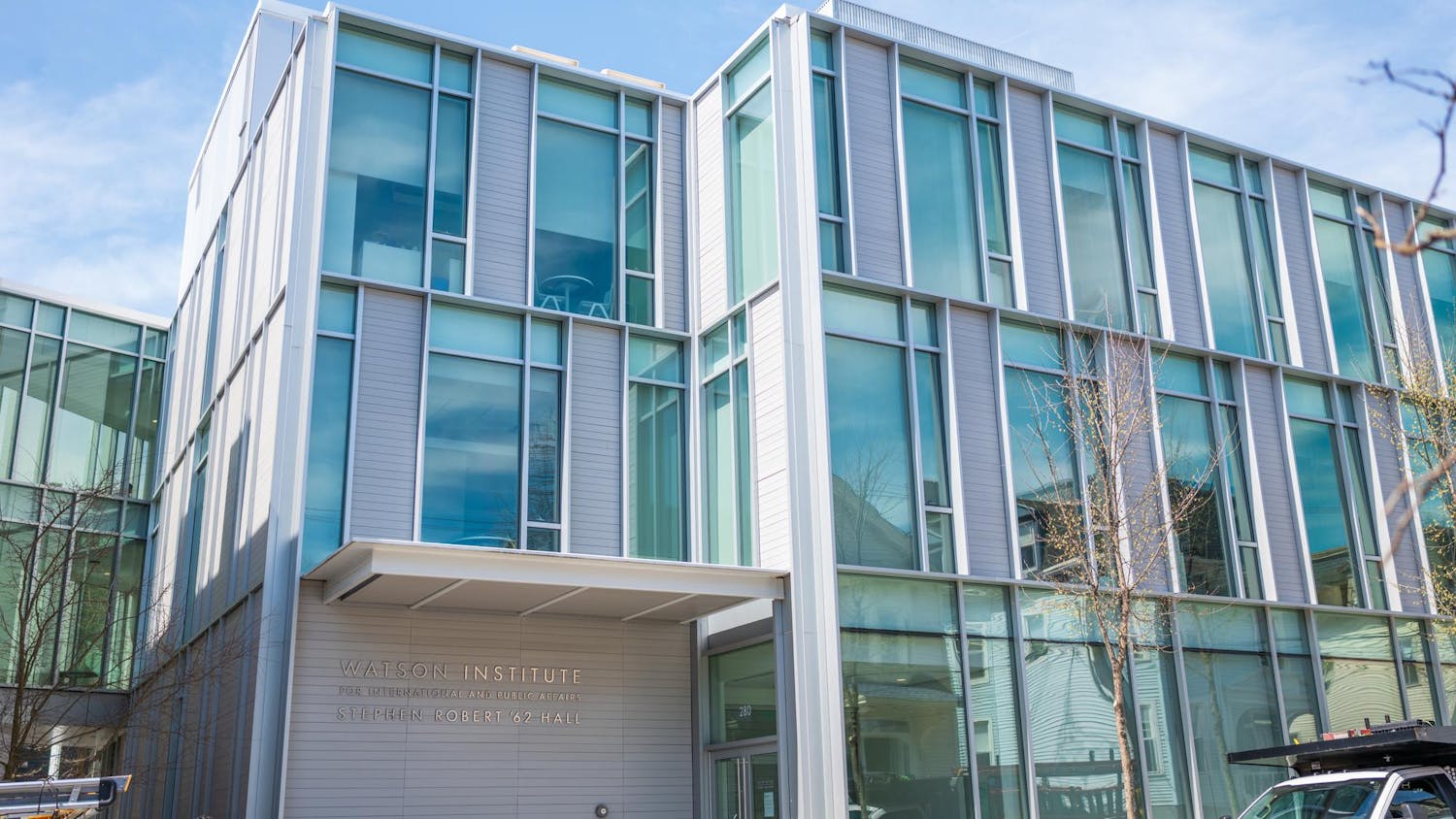 A photo of the outside of the Watson School for International and Public Affairs on a sunny day.