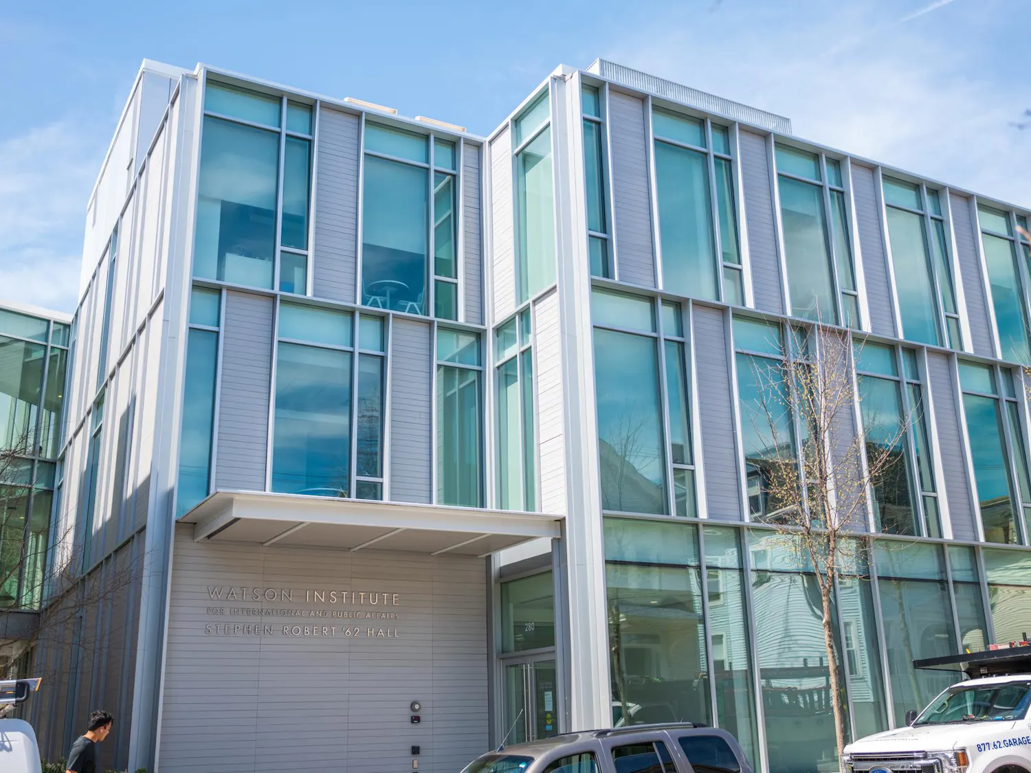 A photo of the outside of the Watson School for International and Public Affairs on a sunny day.