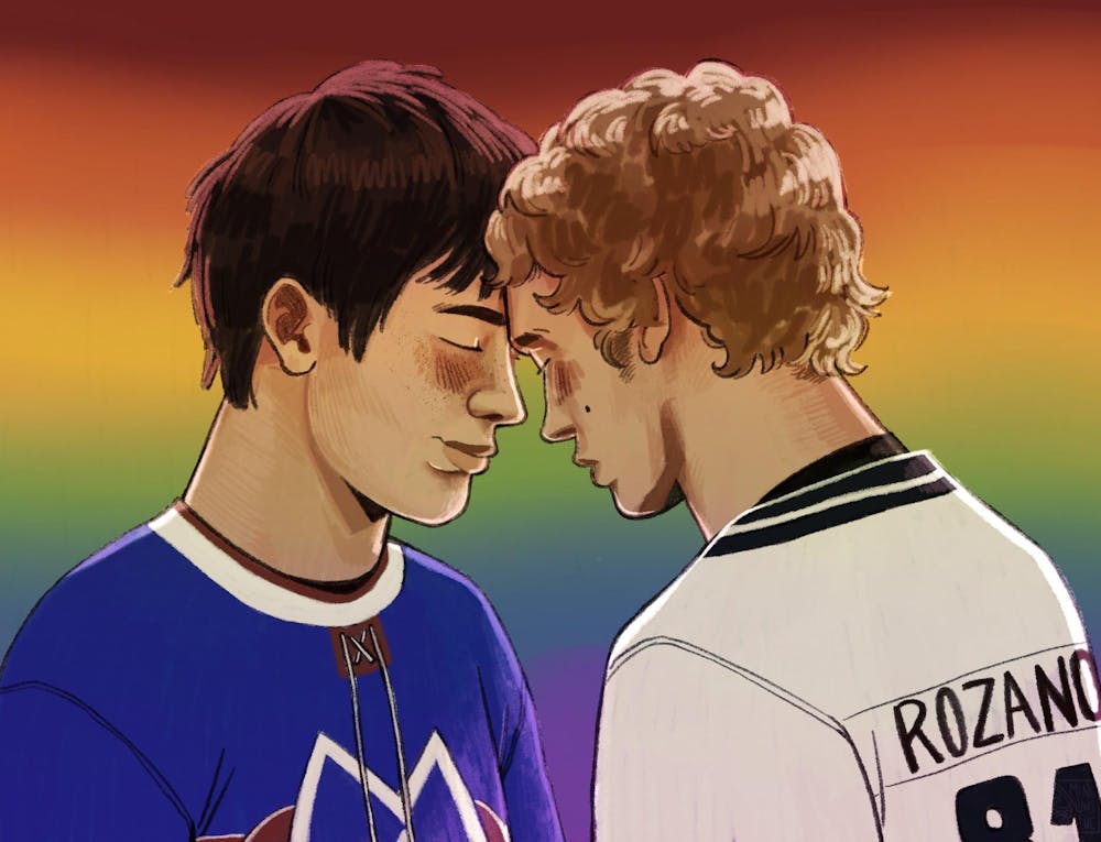 Man in blue jersey standing forehead-to-forehead with man in white jersey. 