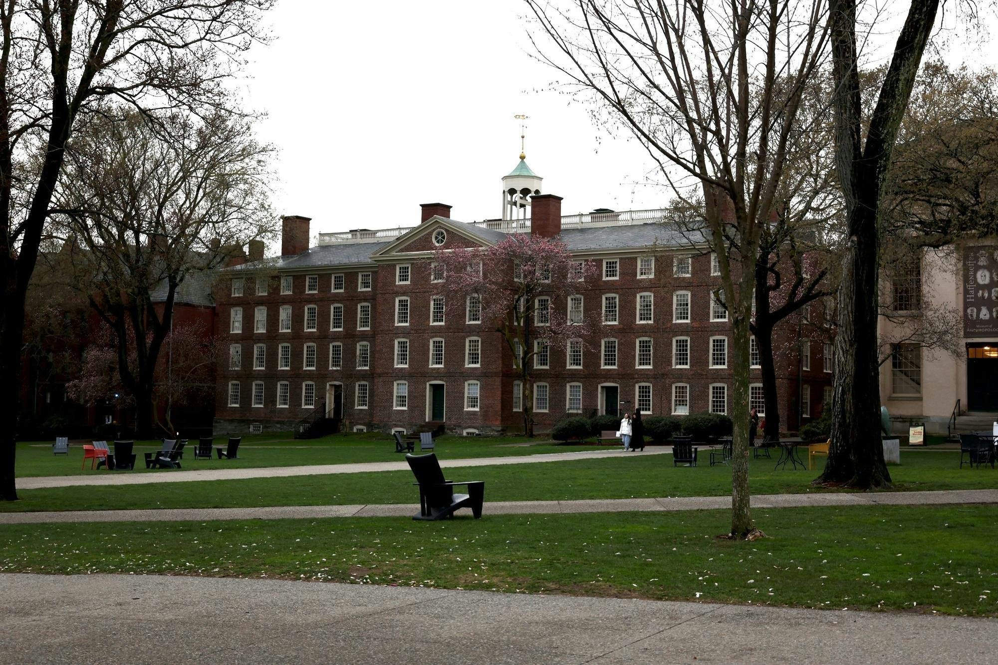 A photo of the Main Green with University Hall in the background on a cloudy day.