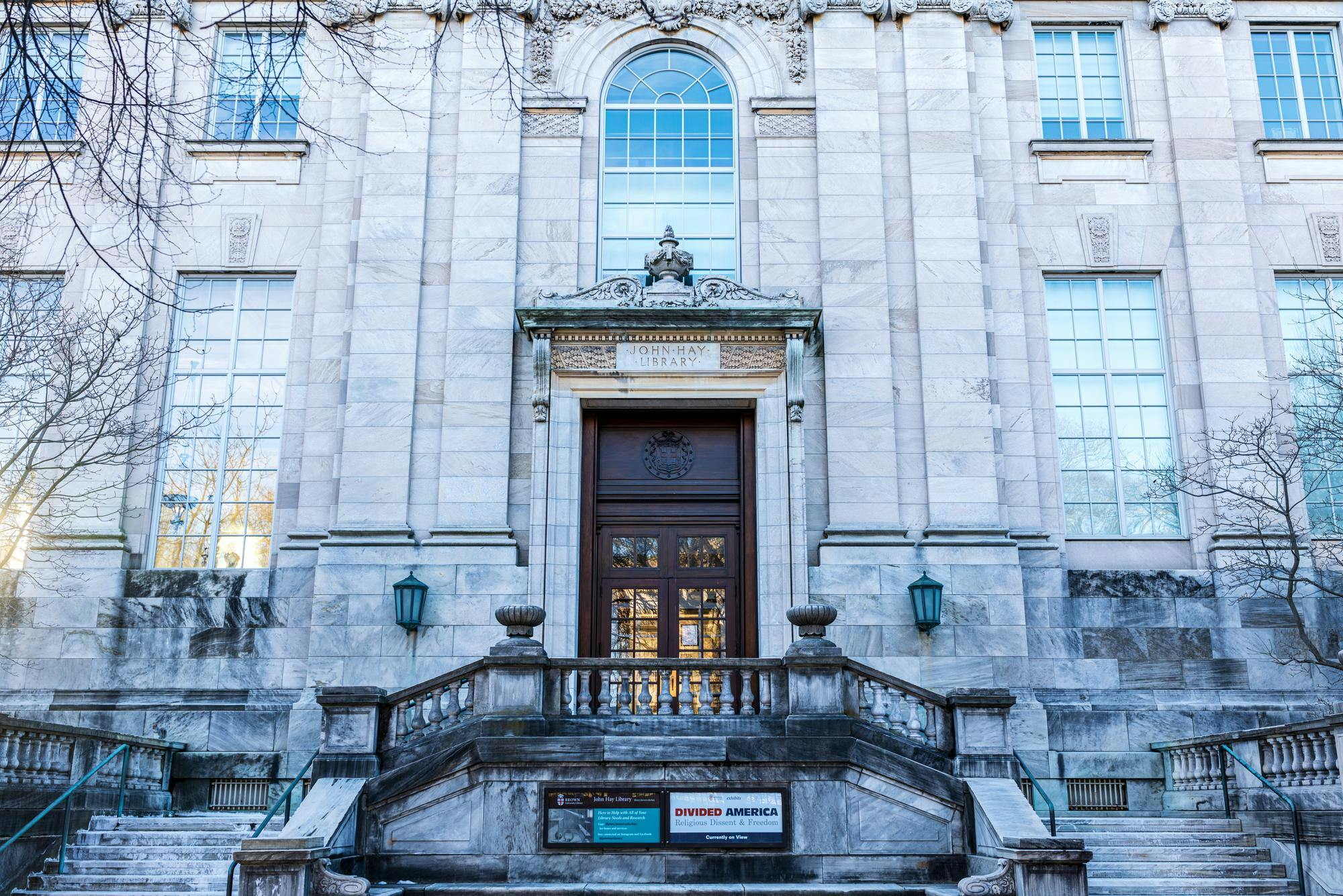 A photo of the main entrance of the John Hay Library.