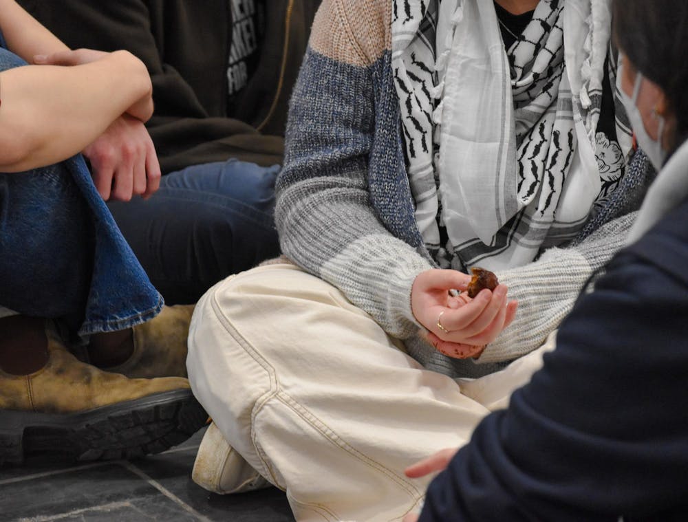 <p>At the Campus Center, strikers shared their experiences and demonstrators sang before breaking fast by eating dates.</p>