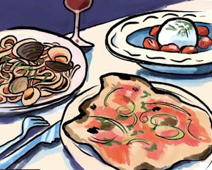 An illustration of plates of Italian dishes on a table.