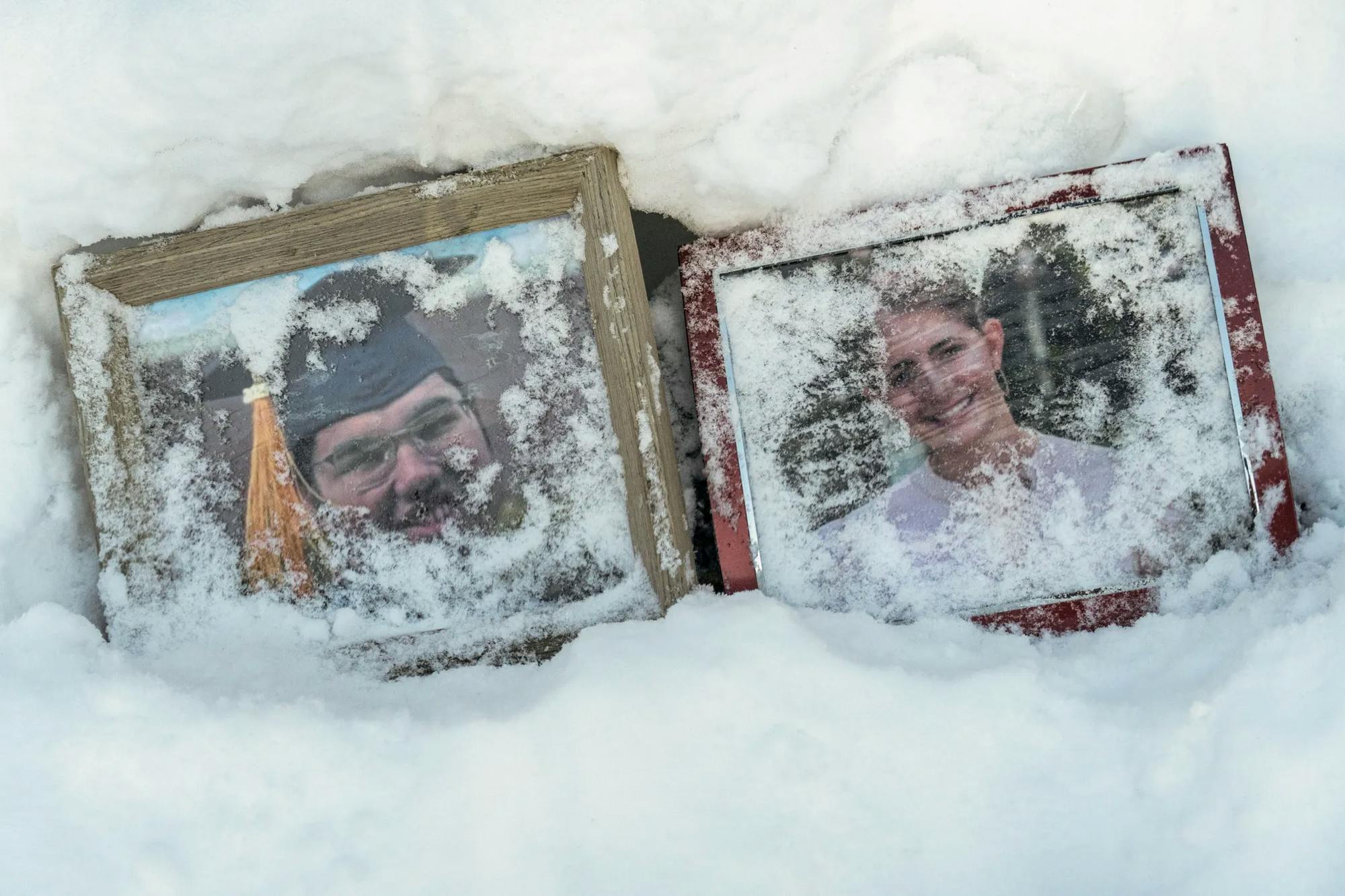 A close-up image shows Mukhammad Aziz Umurzokov and Ella Cook’s framed portraits in the snow, side by side under the Van Wickle Gates.