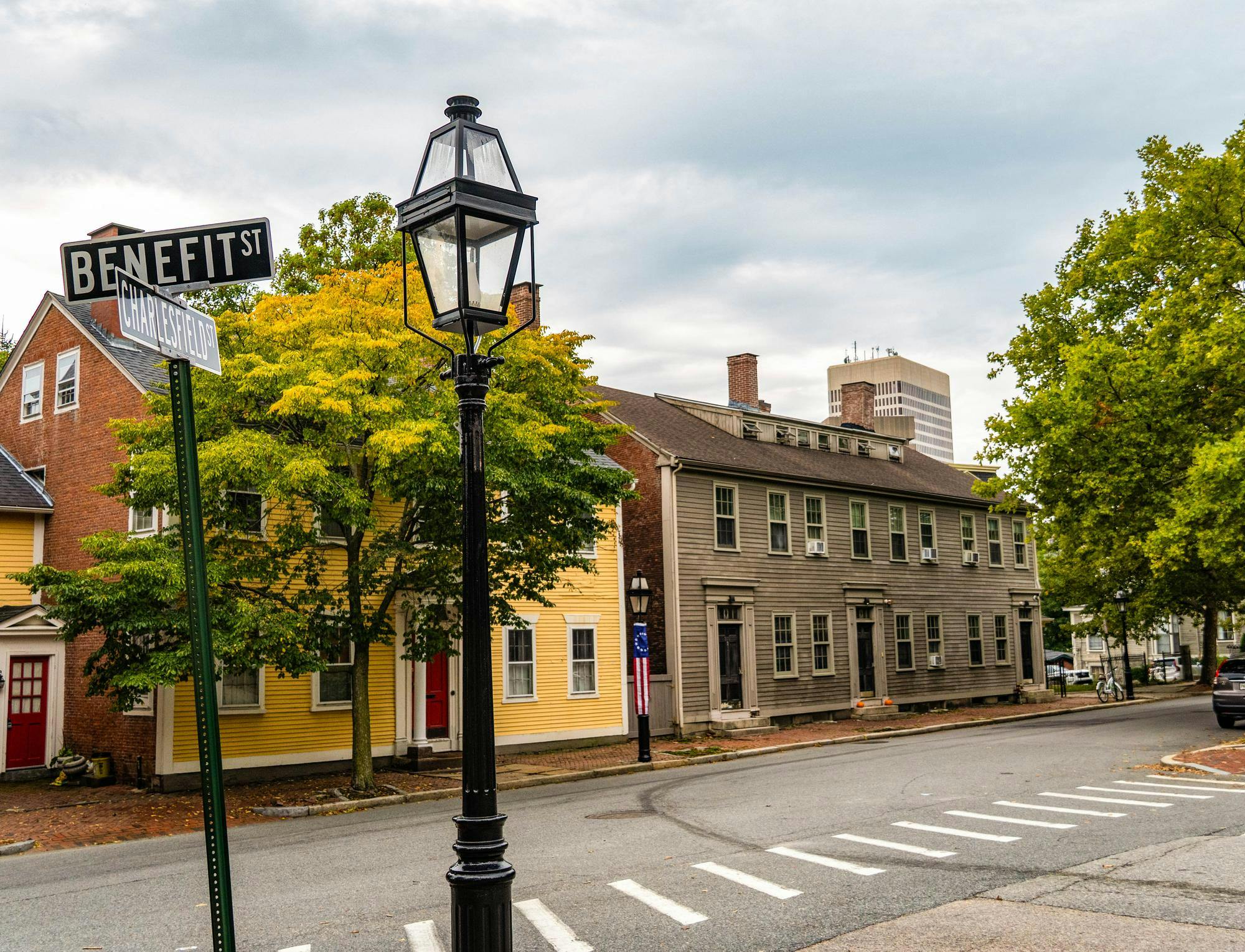 A photo of two colonial-style houses on College Hill at the corner of Benefit and Charlesfield.

