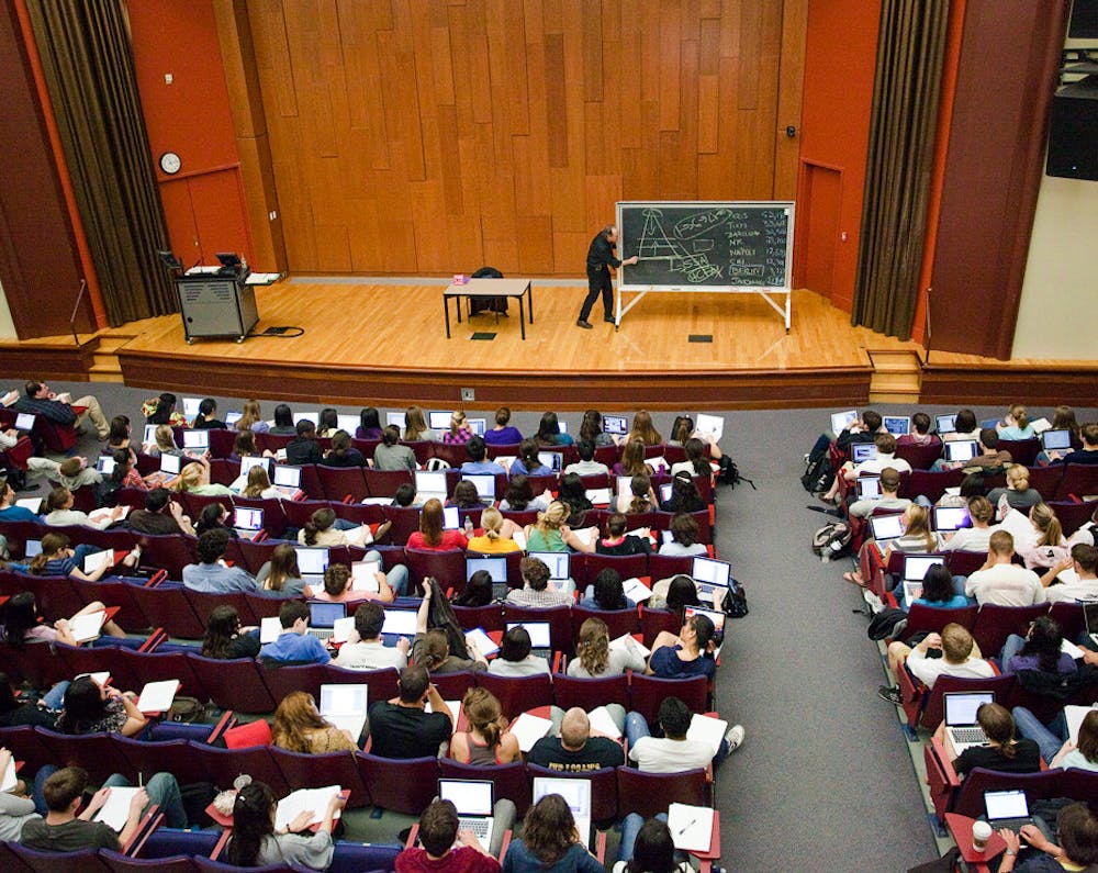 <p>Courtesy of James Morone</p><p>To keep students in the large lecture class engaged, Morone often walks up and down the aisles and cold-calls on students.</p>