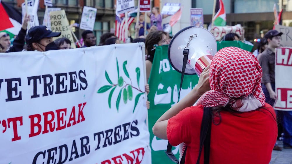 Following the Main Green protest, the students were joined by about 50 Rhode Island School of Design students near Carr Haus cafe before they all walked to the R.I. state house rally together.