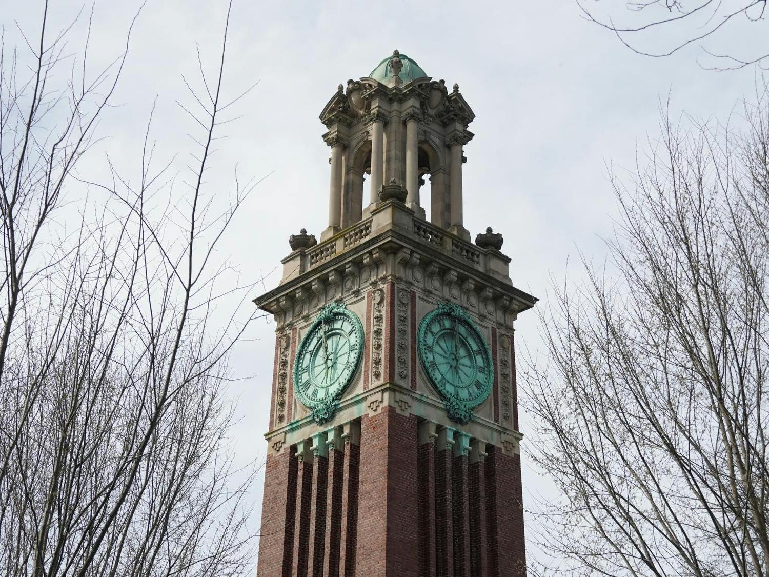 A photo of the top of Carrie Tower against a gray sky.