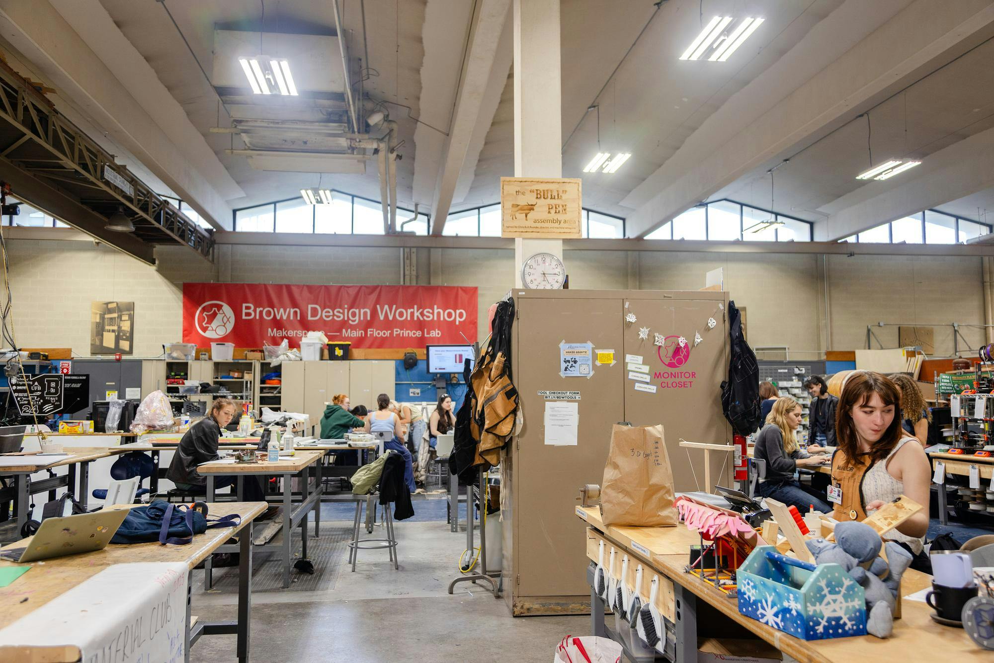 Photo of the Brown Design Workshop with students working at tables.