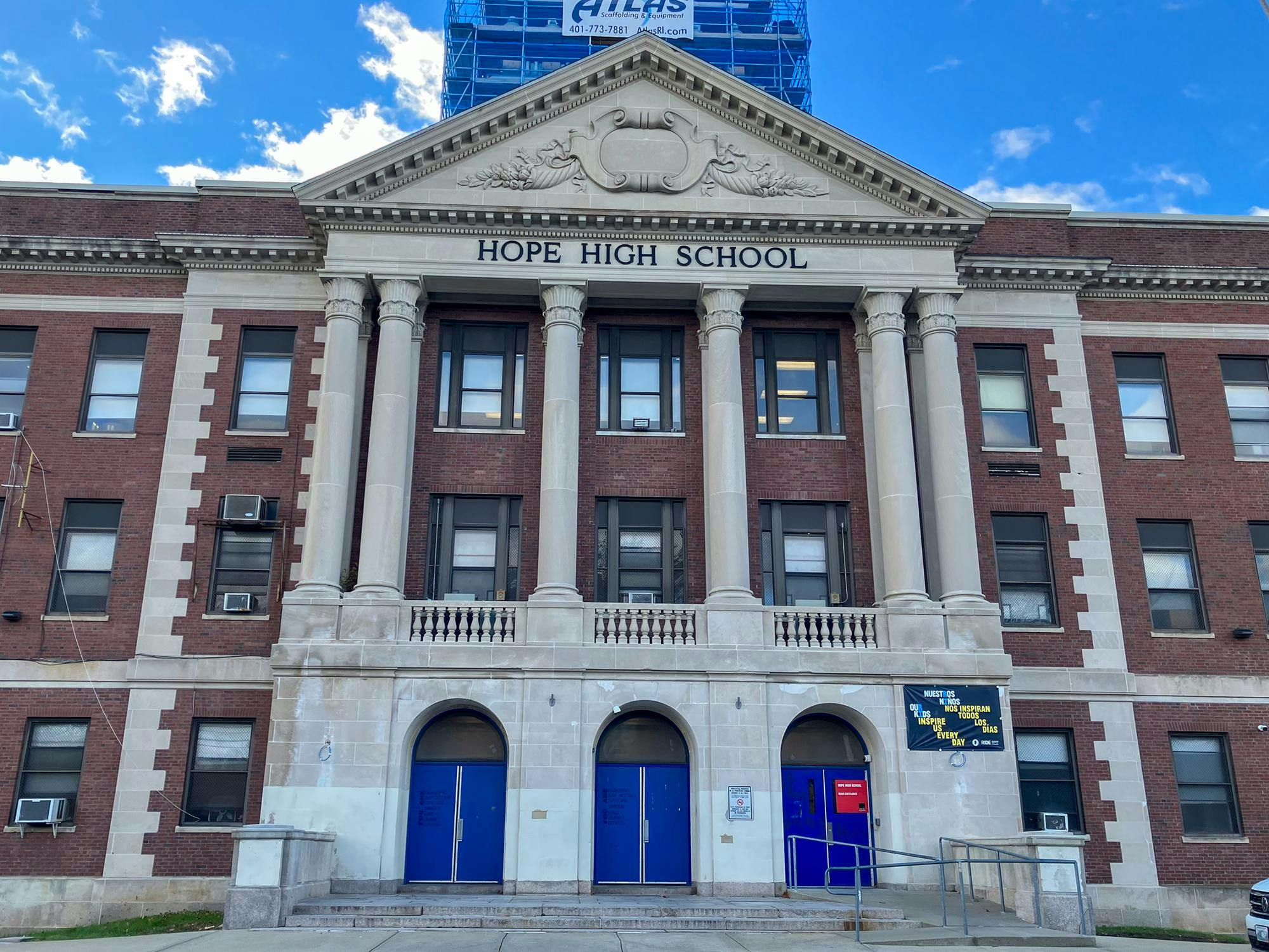 A picture of a brick high school.