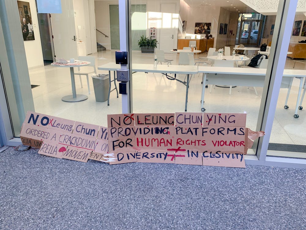 <p>On the morning of Leung Chun-ying’s virtual speech at the Brown China Summit, a graduate student brought cardboard signs to Stephen Robert ’62 Hall in protest of the former Hong Kong chief executive’s presence at the summit.</p>