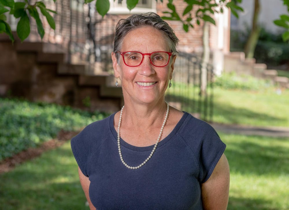 A photo of Janet Blume on a sunny day on one of the University's greens.