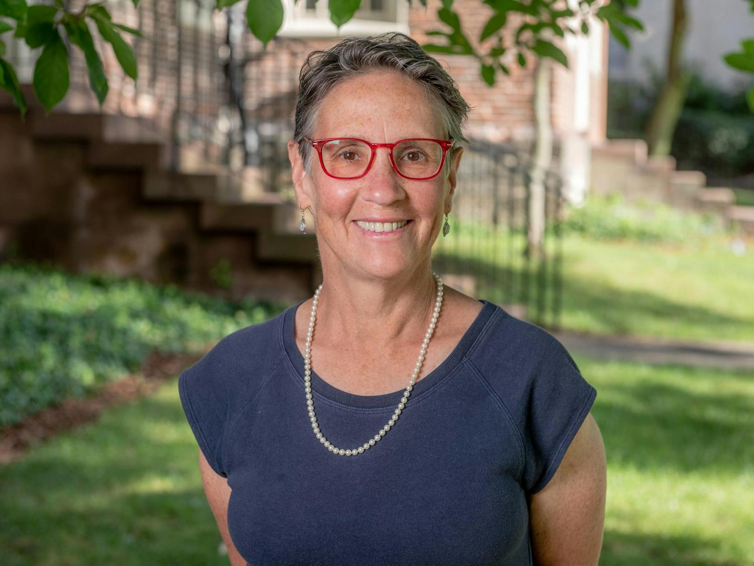 A photo of Janet Blume on a sunny day on one of the University's greens.
