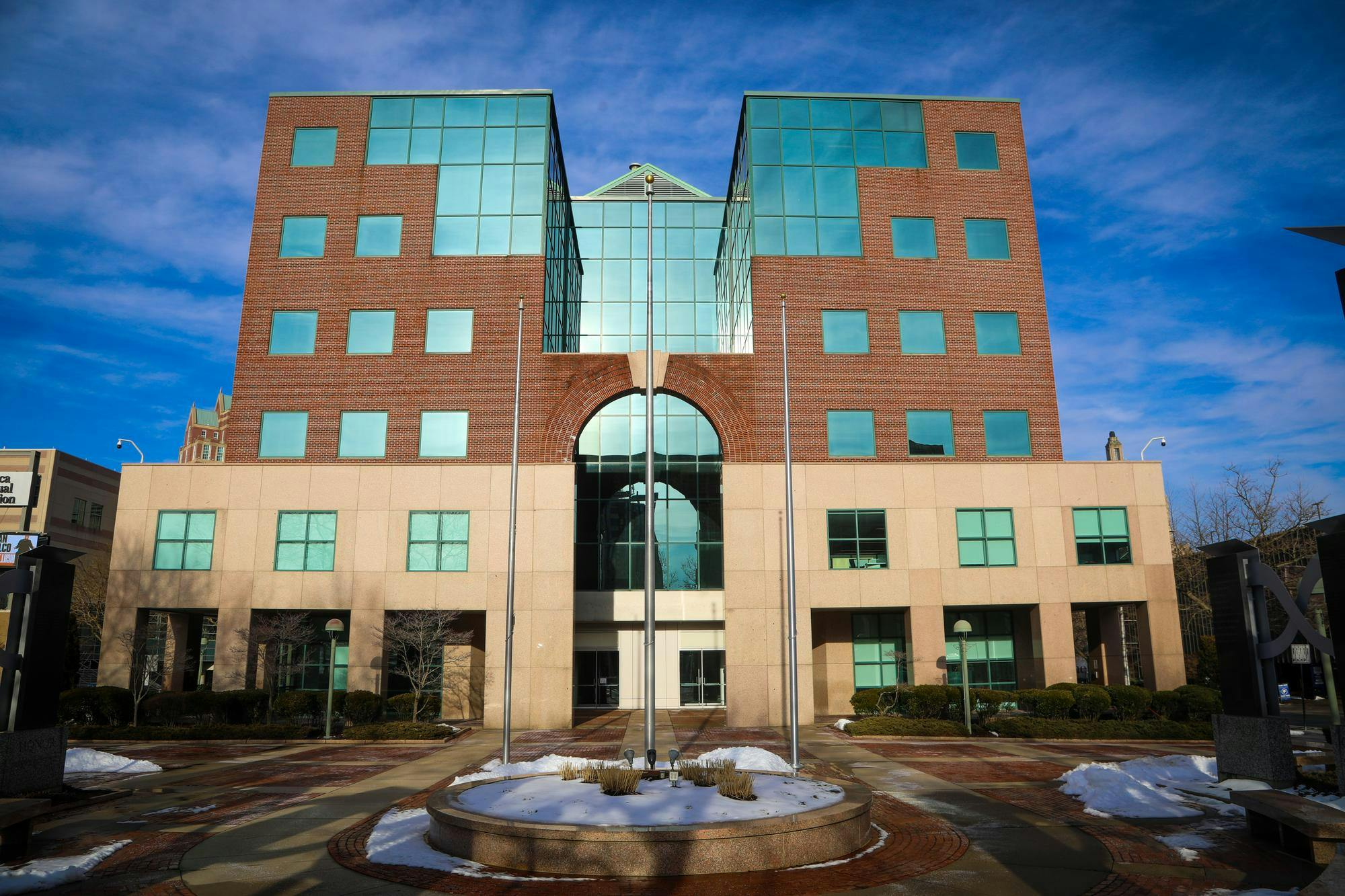 Photo showing the building that Brown University Health's administrative offices will move into — a brick building with lots of windows at 15 LaSalle Square.
